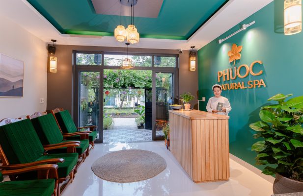 Interior view of the peaceful reception area and garden entrance at Phước Natural Spa in Hoi An